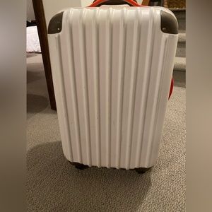 Carry on luggage suitcase.